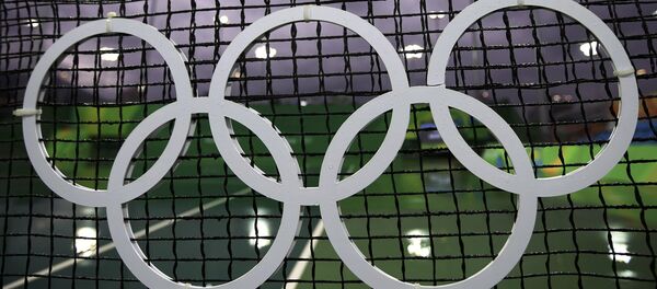 Олимпийские кольца на спортивном объекте в Рио-де-Жанейро - Sputnik Беларусь