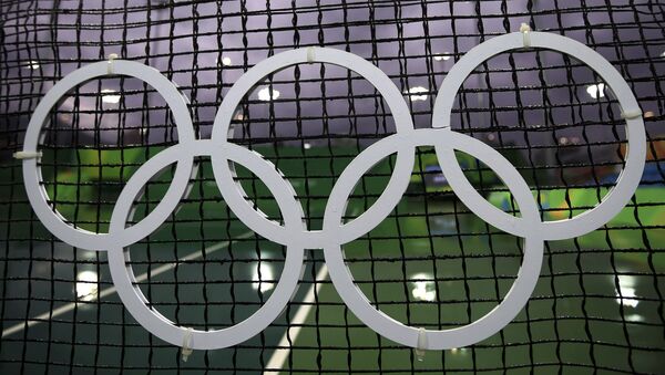 Олимпийские кольца на спортивном объекте в Рио-де-Жанейро - Sputnik Беларусь