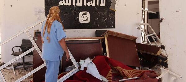 Флаг ИГИЛ в освобожденном городе в Ливии - Sputnik Беларусь