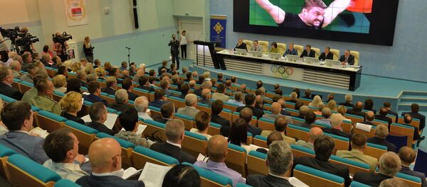 Наталля Качанава і Максім Рыжанкоў на сумеснай калегіі Мінспорту і НАК Наталля Качанава і Максім Рыжанкоў на сумеснай калегіі Мінспорту і НАК - Sputnik Беларусь
