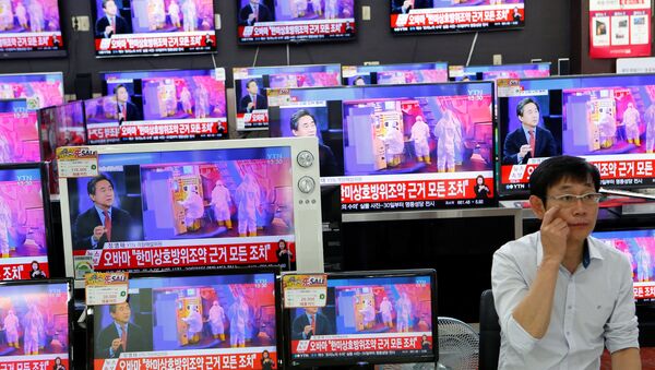 Сообщение о ядерных испытаниях по ТВ в Южной Корее - Sputnik Беларусь