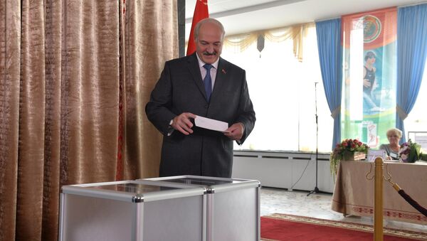 Президент Беларуси Александр Лукашенко на выборах, архивное фото - Sputnik Беларусь