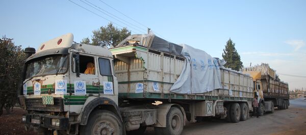 Конвой с гуманитарной помощью ООН в Сирии подвергся обстрелу - Sputnik Беларусь