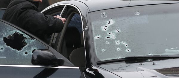 Обстрелянный автомобиль, архивное фото - Sputnik Беларусь
