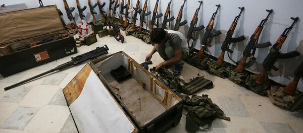 Склад оружия повстанцев в городе Алеппо - Sputnik Беларусь