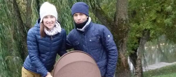 Дарья Домрачева с Уле-Эйнером Бьорндаленом и ребенком - Sputnik Беларусь