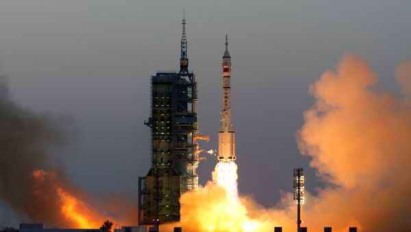 Китай запустил пилотируемый космический корабль Шэньчжоу-11 - Sputnik Беларусь