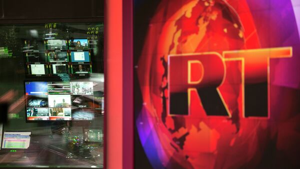 Control room of the Russia Today English-language newsroom. - Sputnik Беларусь