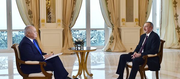 Ильхам Алиев ответил на вопросы Дмитрия Киселева Ильхам Алиев ответил на вопросы Дмитрия Киселева - Sputnik Беларусь