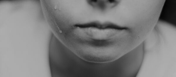 Плачущая девушка, архивное фото Плачущая девушка, архивное фото - Sputnik Беларусь