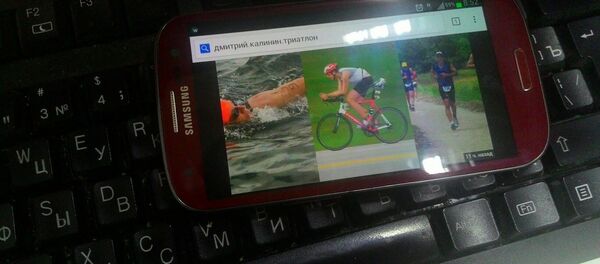 Латвийский триатлонист Дмитрий Калинин - Sputnik Беларусь