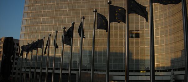 Флаги Евросоюза возле штаб-квартиры ЕС, Брюссель - Sputnik Беларусь