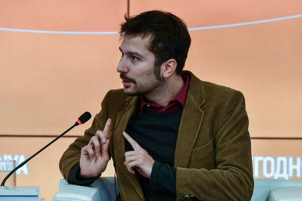 Итальянский фотограф Данило Ди Мео во время мультимедийной пресс-конференции на тему: Летиция. История невидимой жизни - Sputnik Беларусь