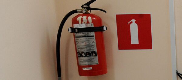 Огнетушитель на стене - Sputnik Беларусь