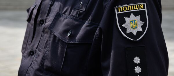 Сотрудник Украинской полиции в Киеве - Sputnik Беларусь