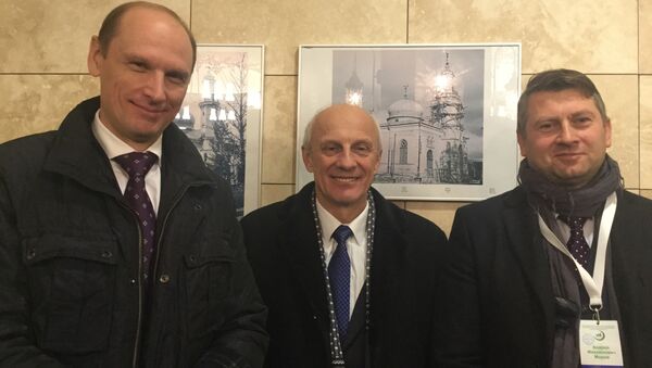Председатель БФМ Максим Мисько (слева) с сотрудниками фонда - Sputnik Беларусь