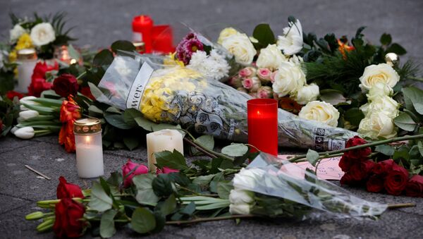 Цветы на месте трагедии в Берлине - Sputnik Беларусь
