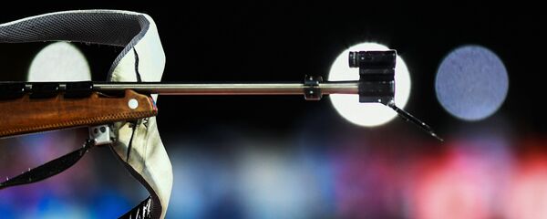 Биатлонист на огневом рубеже, архивное фото Биатлонист на огневом рубеже, архивное фото - Sputnik Беларусь