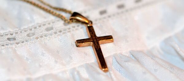 Нательный крестик, архивное фото Нательный крестик, архивное фото - Sputnik Беларусь