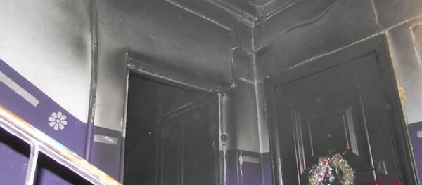 Дверь сгоревшей в Мозыре квартиры - Sputnik Беларусь