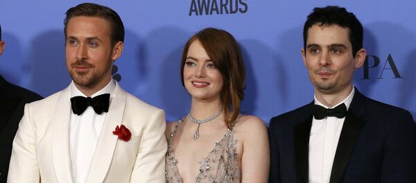 Уладальнікі Залатога глобуса Раян Гослінг, Эма Стоўн і Даміян Шазель Уладальнікі Залатога глобуса Раян Гослінг, Эма Стоўн і Даміян Шазель - Sputnik Беларусь