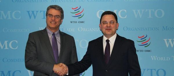 Первый заместитель министра иностранных дел Беларуси Андрей Евдоченко (справа) и Генеральный директор ВТО Роберто Азеведо - Sputnik Беларусь