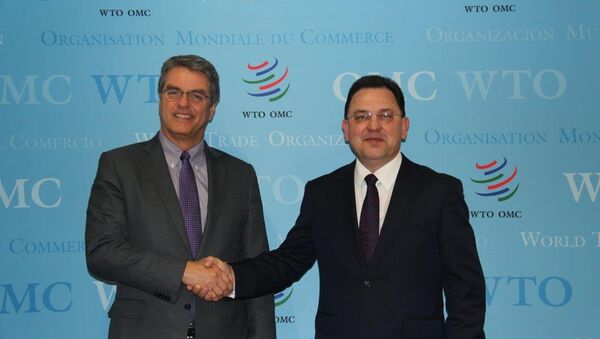 Первый заместитель министра иностранных дел Беларуси Андрей Евдоченко (справа) и Генеральный директор ВТО Роберто Азеведо - Sputnik Беларусь