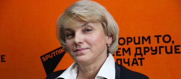 Начальник управления учета и распоряжения акциями ГКИ Анна Корниевич Начальник управления учета и распоряжения акциями ГКИ Анна Корниевич - Sputnik Беларусь