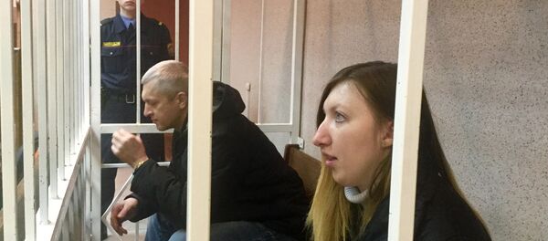 Обвиняемые Александр Жильников и Анастасия Шульганова Обвиняемые Александр Жильников и Анастасия Шульганова - Sputnik Беларусь