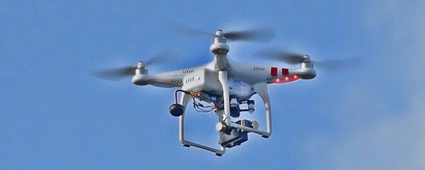 Квадрокоптер, архивное фото Квадрокоптер, архивное фото - Sputnik Беларусь