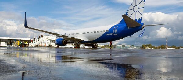Самалёт Белавія ў аэрапорце Жуляны Самалёт Белавія ў аэрапорце Жуляны - Sputnik Беларусь