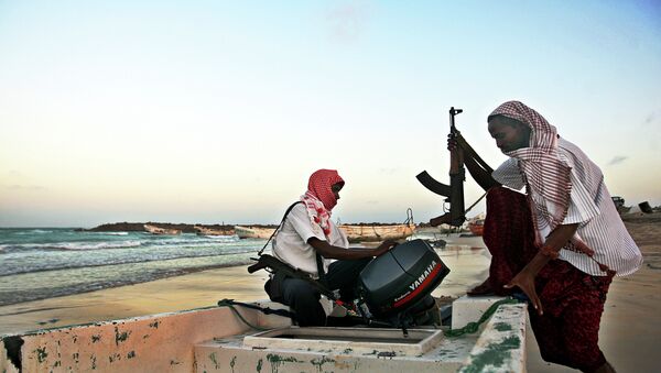 Somali pirates carrying out preparations to a skiff in Hobyo, northeastern Somalia. File photo - Sputnik Беларусь