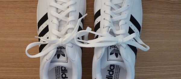 Кроссовки, архивное фото Кроссовки, архивное фото - Sputnik Беларусь