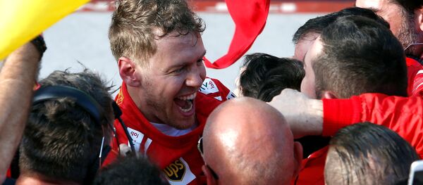 Победитель Гран-при Австралии Себастьян Феттель - Sputnik Беларусь