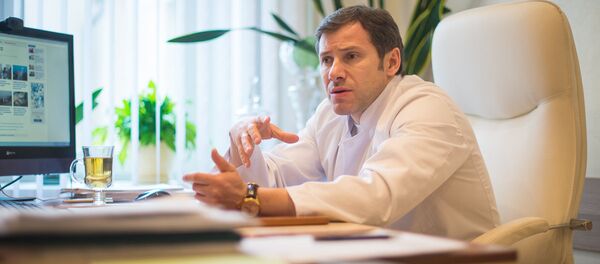 Кіраўнік РНПЦ транспланталогіі Алег Румо Кіраўнік РНПЦ транспланталогіі Алег Румо - Sputnik Беларусь
