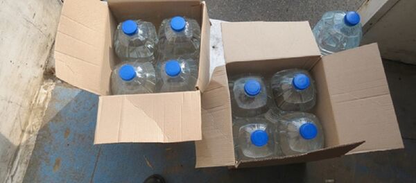 Изъятый правоохранителями спирт Изъятый правоохранителями спирт - Sputnik Беларусь