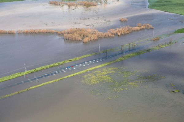Как сообщается, зона наводнения растянулась на тысячу километров. - Sputnik Беларусь