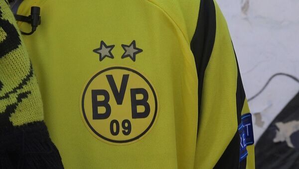 Відэазварот мінскага аматара Borussia Dortmund да каманды пасля выбуху - Sputnik Беларусь