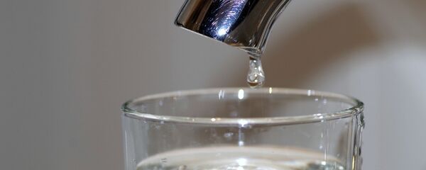 Водопроводный кран, архивное фото - Sputnik Беларусь