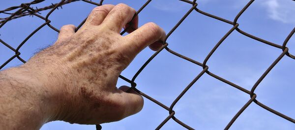 Человек за решеткой - Sputnik Беларусь