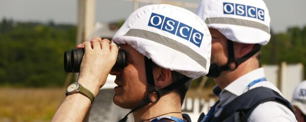 Наблюдатели СММ ОБСЕ в Донбассе, архивное фото - Sputnik Беларусь