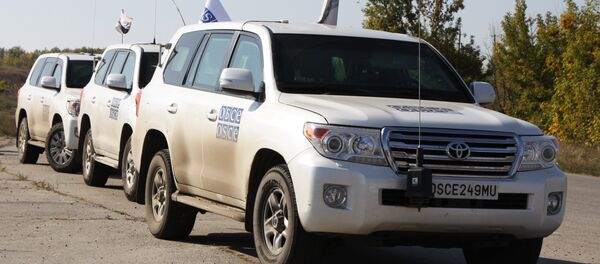 Машины ОБСЕ в Донбассе, архивное фото - Sputnik Беларусь