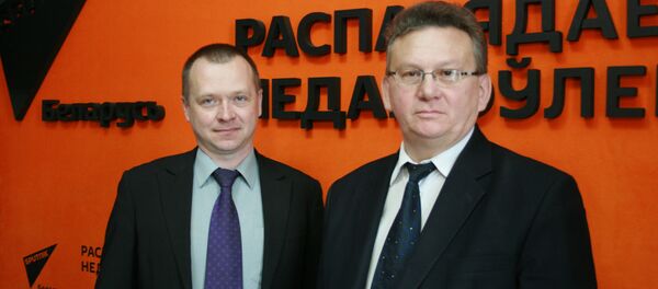 Представители Департамента по ликвидации последствий катастрофы на ЧАЭС Игорь Семененя и Дмитрий Павлов - Sputnik Беларусь
