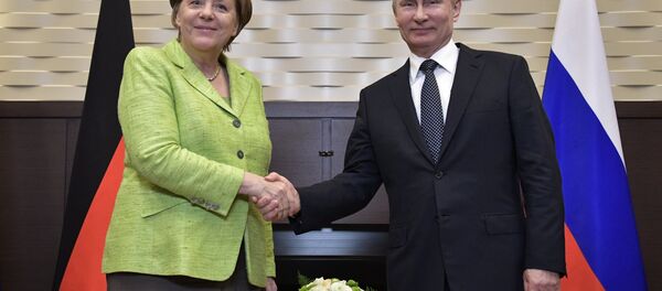 Президент РФ Владимир Путин и федеральный канцлер ФРГ Ангела Меркель - Sputnik Беларусь
