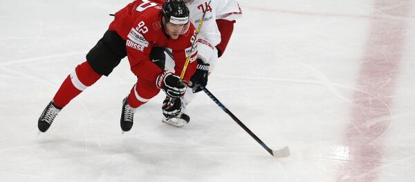 Игровой момент в матче на ЧМ Игровой момент в матче на ЧМ - Sputnik Беларусь