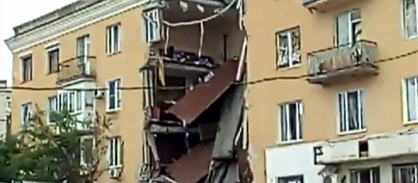 Взрыв обрушил перекрытия четырехэтажного дома в Волгограде - Sputnik Беларусь