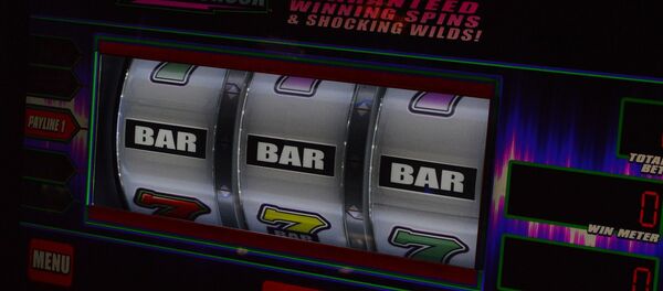 Игровой автомат в казино, архивное фото Игровой автомат в казино, архивное фото - Sputnik Беларусь