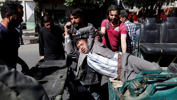 Пострадавшие в результате взрыва в Кабуле - Sputnik Беларусь