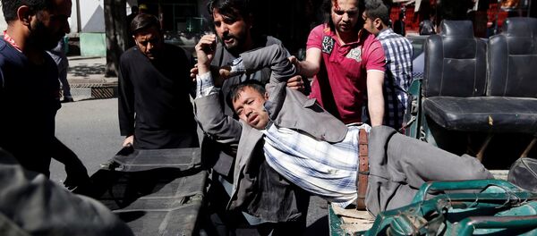 Пострадавшие в результате взрыва в Кабуле - Sputnik Беларусь