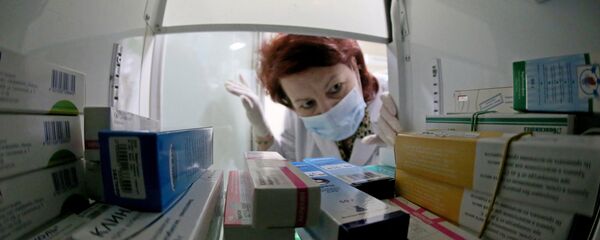 Фармацевт работает в аптеке - Sputnik Беларусь